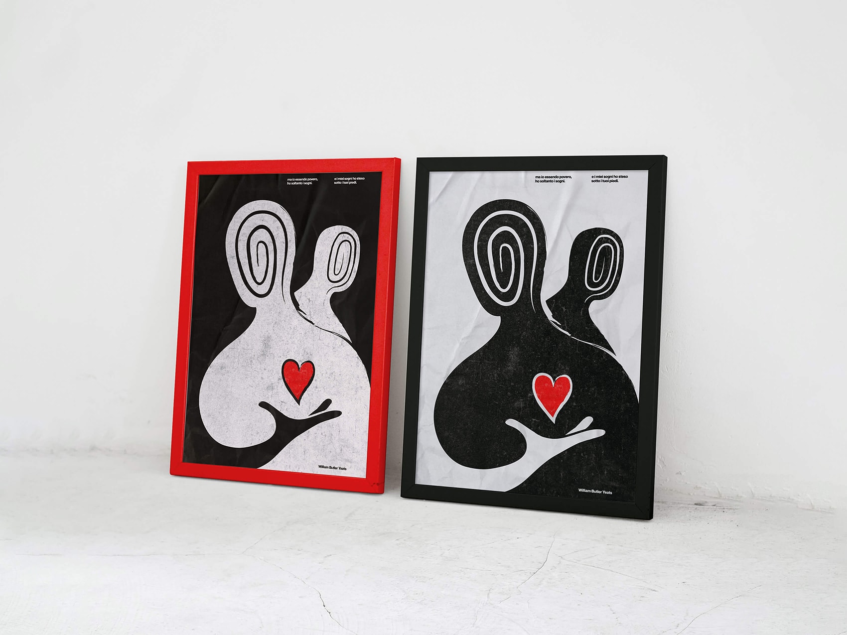 due poster (uno positivo e uno negativo) di una mia illustrazione, rispettivamente con una cornice nera e una rossa appoggiati al muro