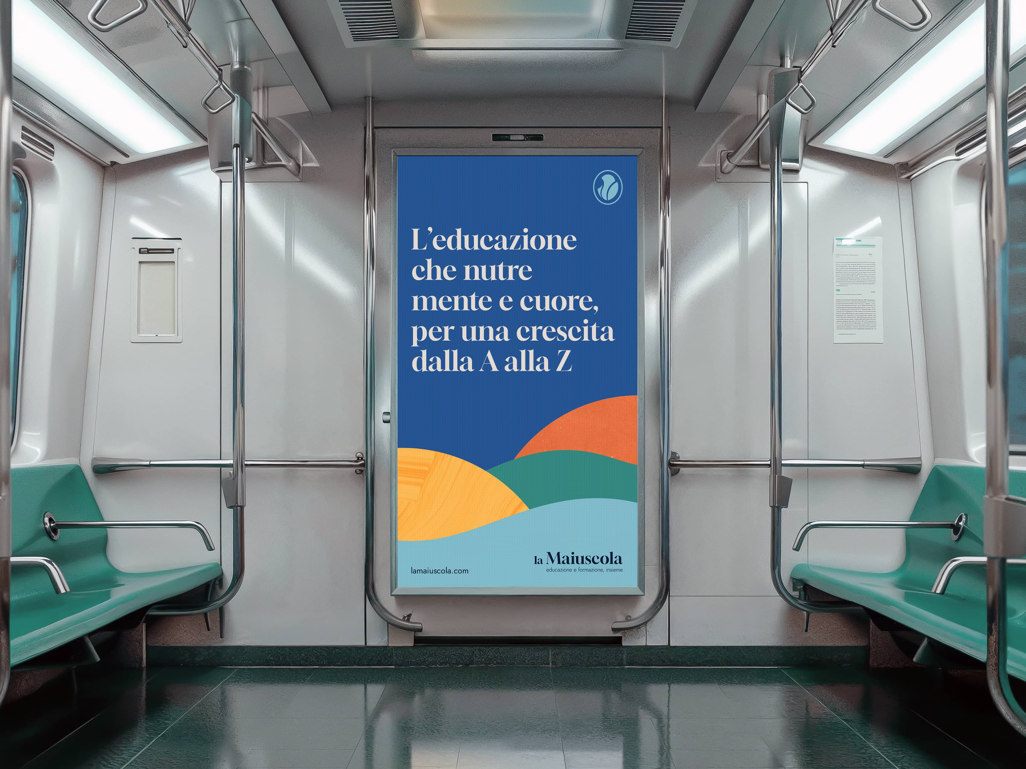 Interior of a subway car with teal seats and a colorful advertisement reading 'L’educazione che nutre mente e cuore, per una crescita dalla A alla Z' on the back wall.