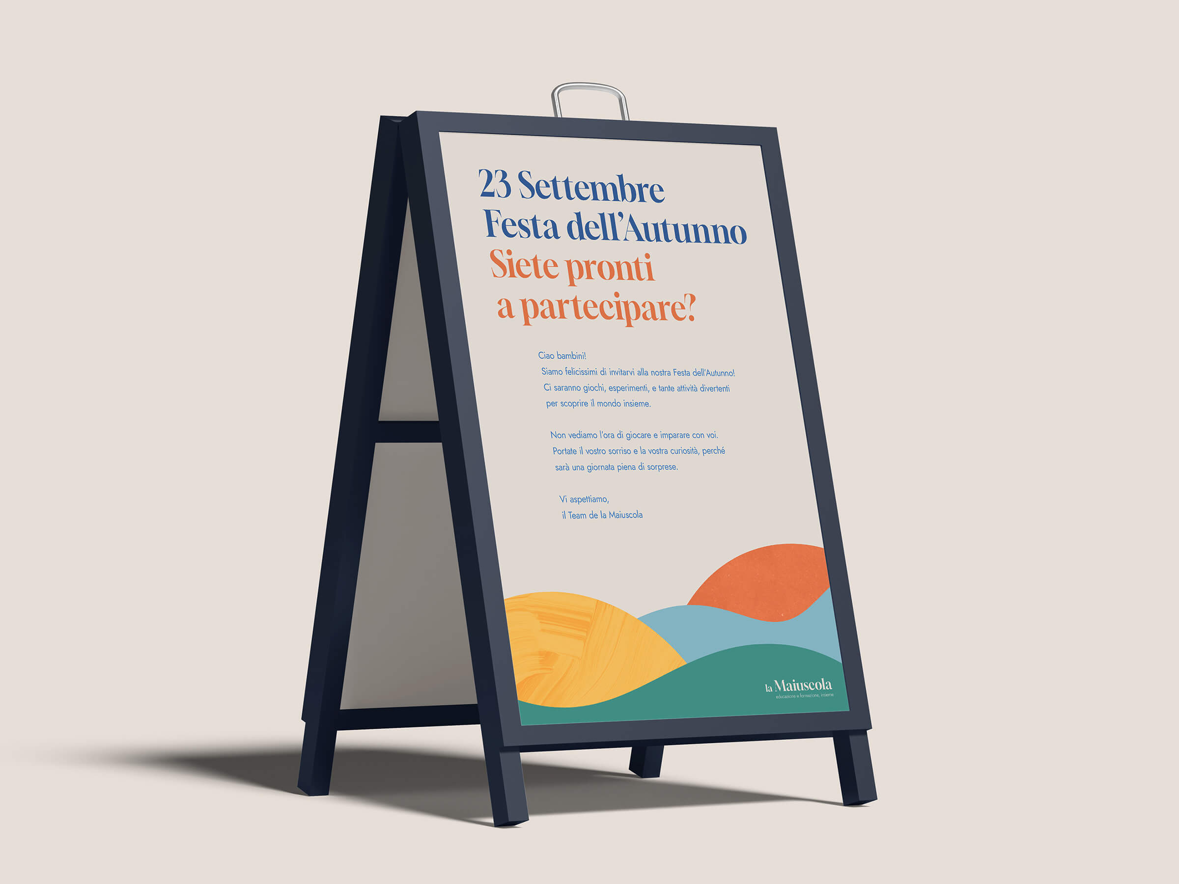 Poster on an easel announcing '23 Settembre Festa dell’Autunno' with colorful abstract hills and details about a children's event.